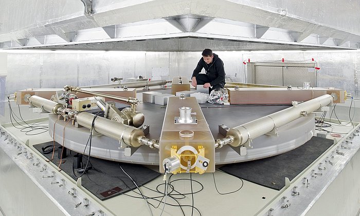 A man works on a ring laser.