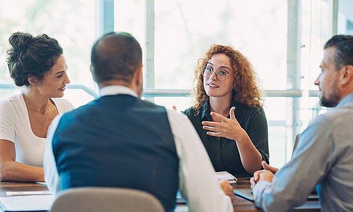 A start-up team discussing