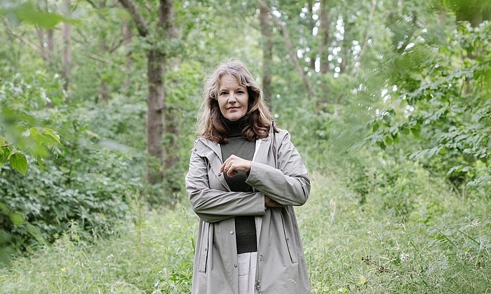 Christine Nellemann, Dean of Sustainability at the Technical University of Denmark, photographed in a wooded area