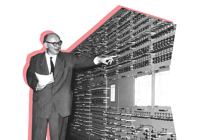 Hans Piloty steht vor der Rechenmaschine PERM