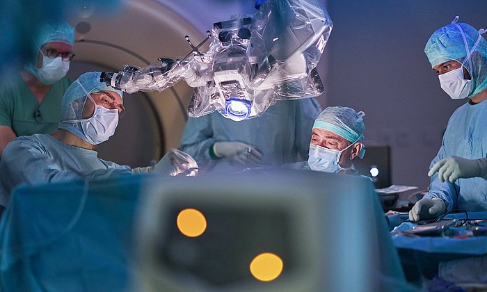 Doctors performing brain surgery at TUM University Hospital