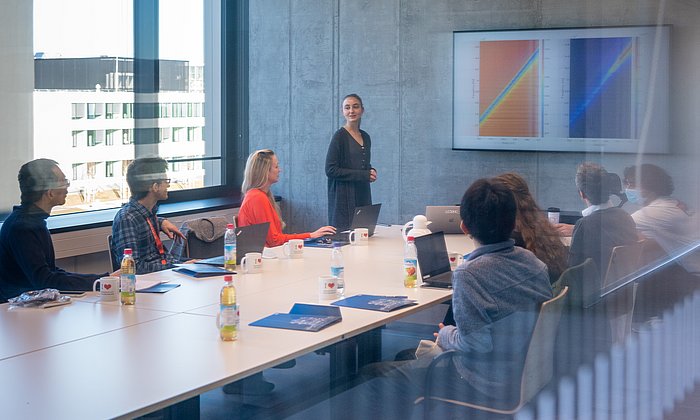 Students and researchers in a lecture room