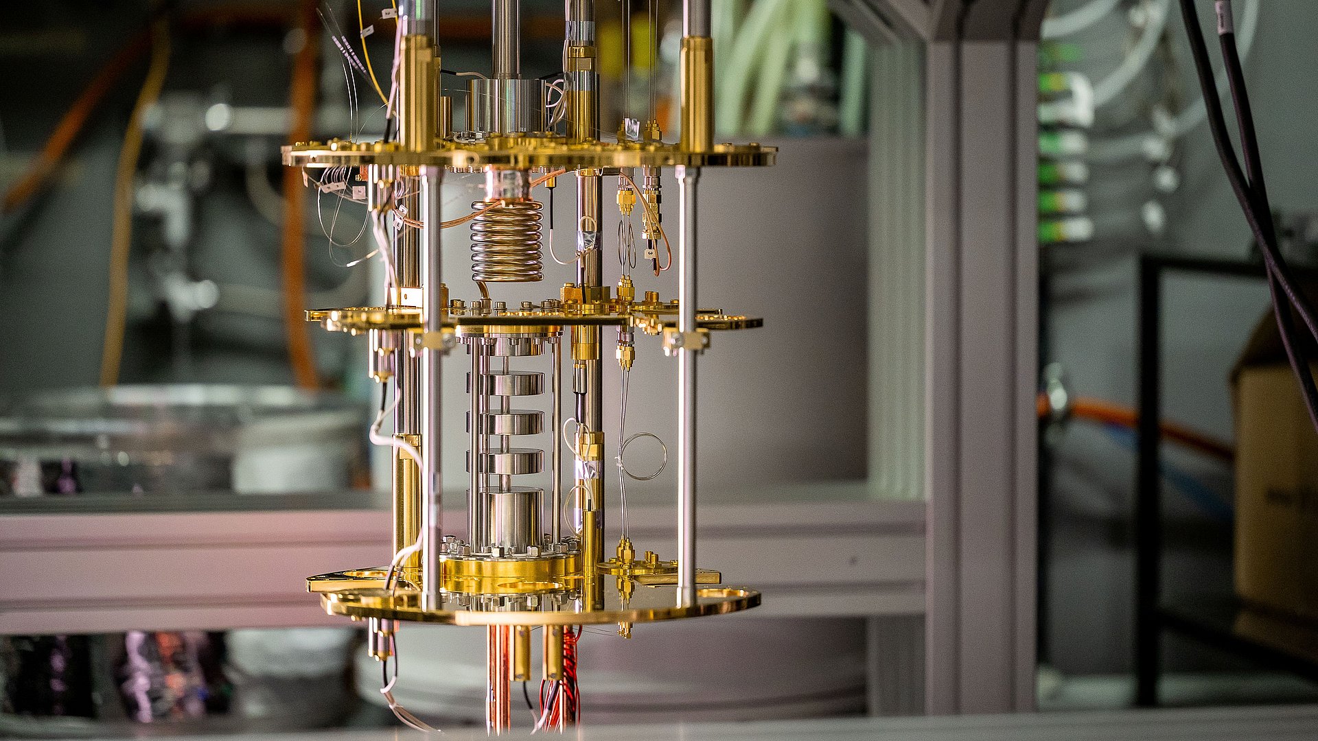 The image shows the cooling structures of an open quantum computer.