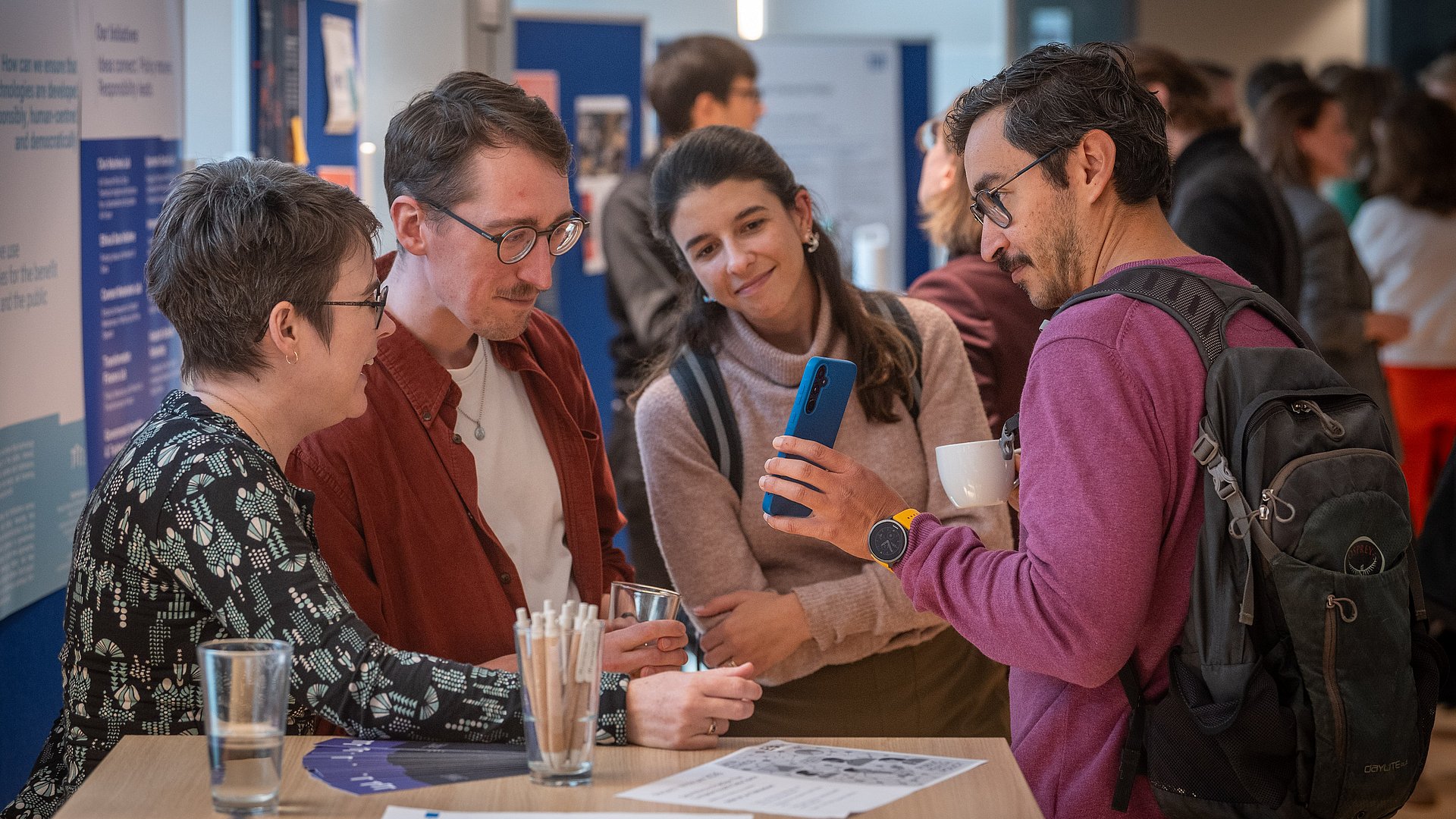 Four people talking at the opening of the TUM Public Science Lab