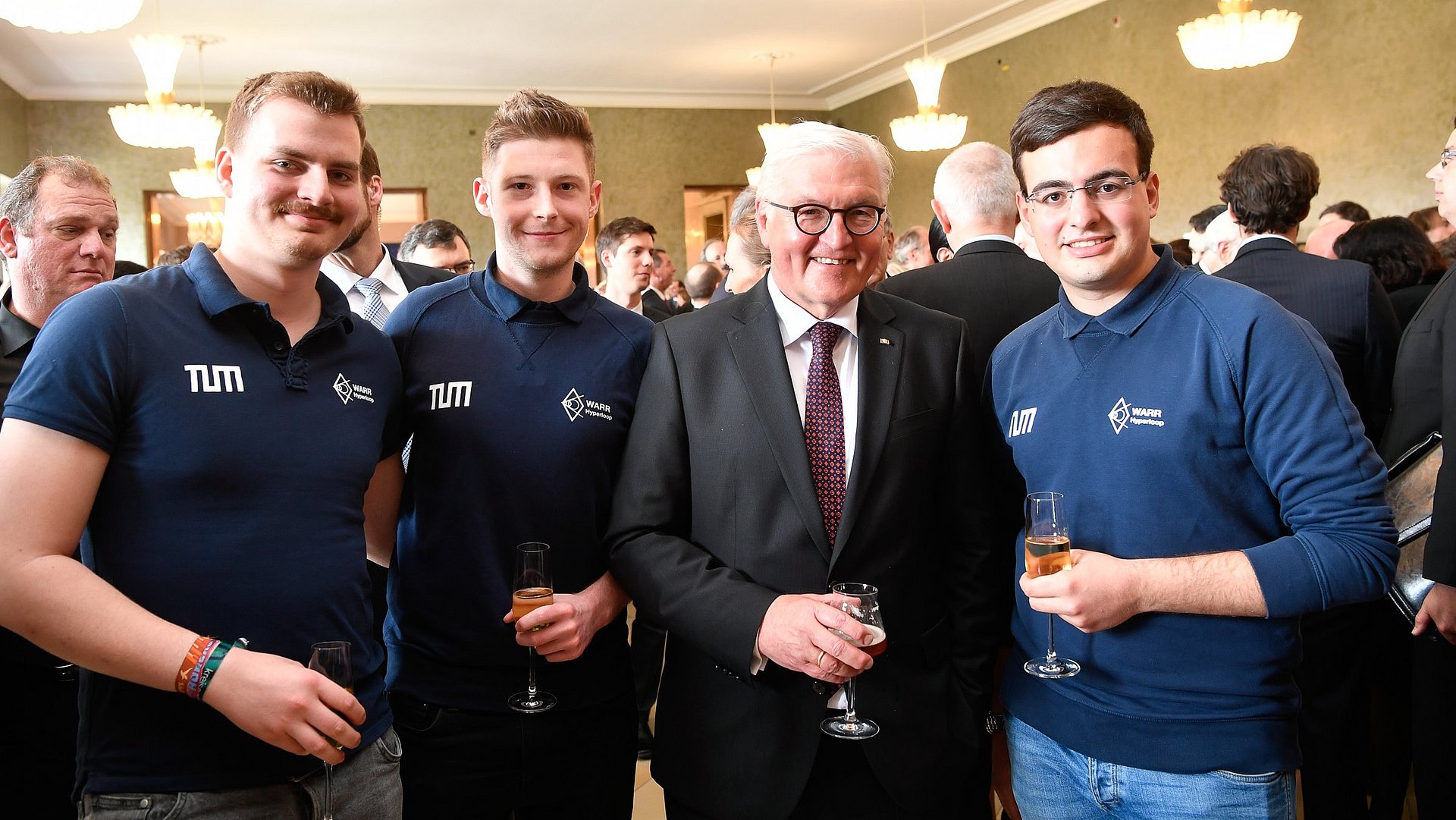 Federal President Frank-Walter Steinmeier with male students from the TUM Hyperloop research program. Steinmeier spoke at the ceremony marking the 150th anniversary of the Technical University of Munich in the Hercules Hall of the Munich Residence.