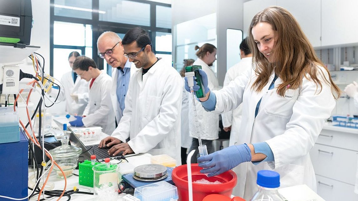 Sample preparation in Prof. Bausch's laboratory by researchers.