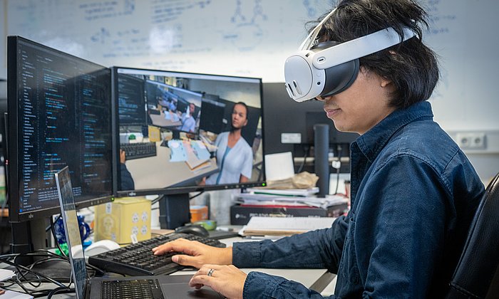 Researcher with virtual reality glasses
