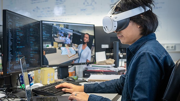 Researcher with virtual reality glasses