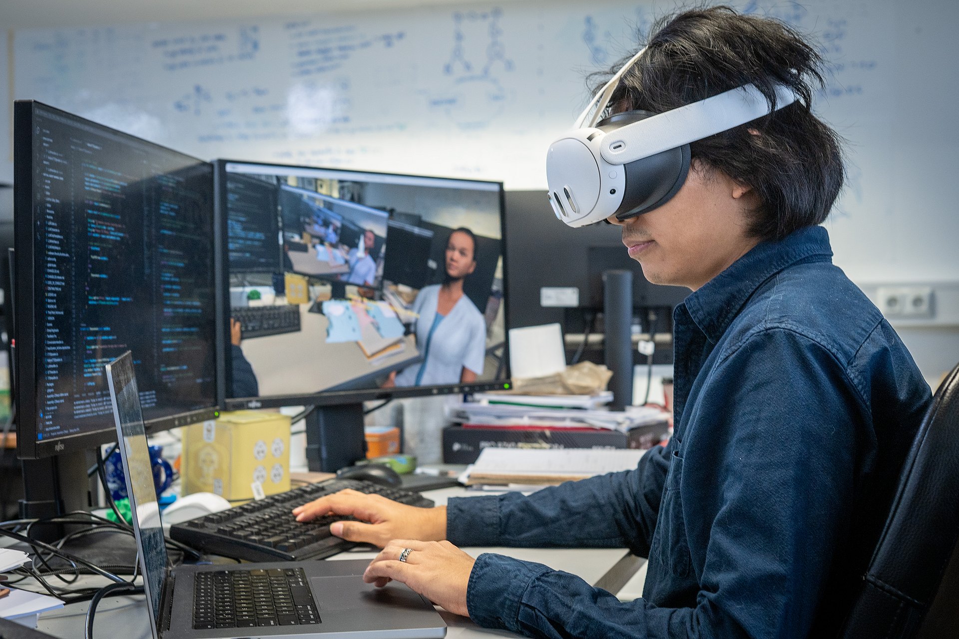 Researcher with virtual reality glasses