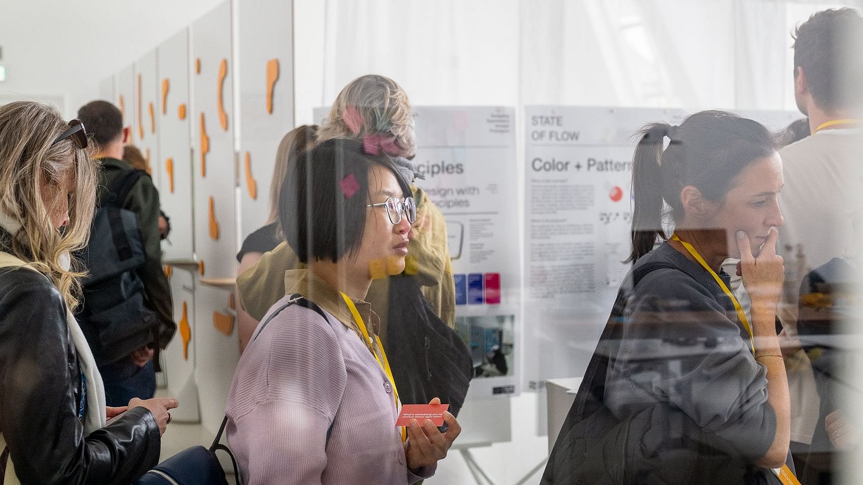 Visitors view the exhibition on design elements.